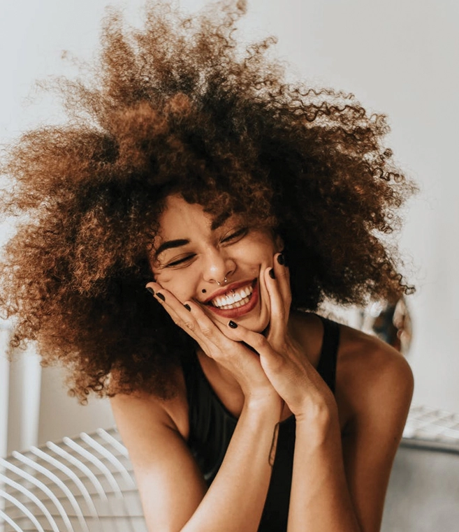 Woman smiling after visiting the best local dentist office